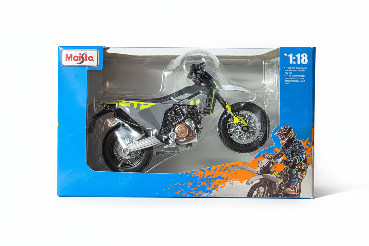 Yellow and Grey Husqvarna motorcycle