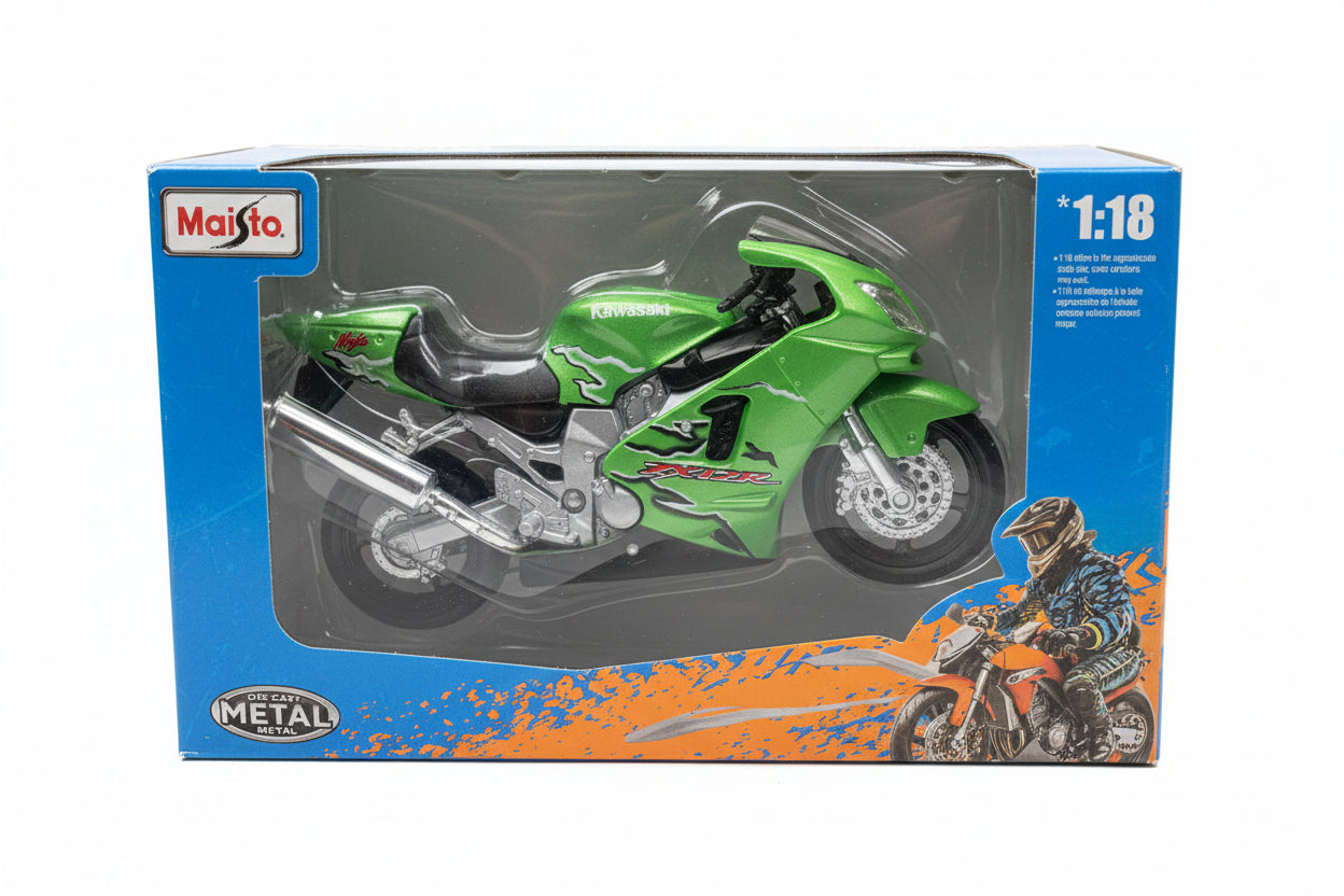 A Maisto 1:18 scale diecast model of a green Kawasaki ZR10 sport motorcycle, shown inside its original blue and clear plastic packaging box.