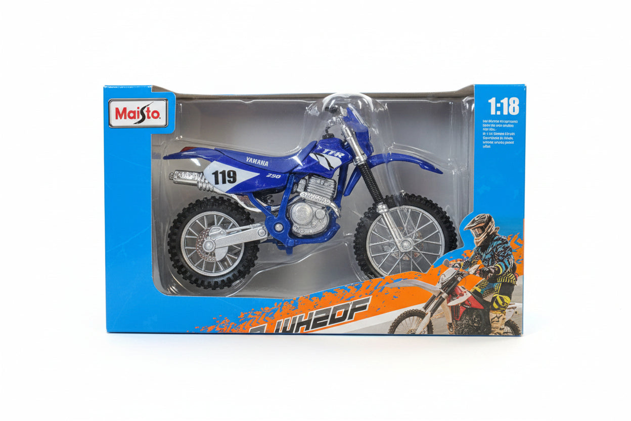 A blue and white yamaha toy dirt bike in its original blister packaging, featuring the Toyo brand logo in the top right corner.